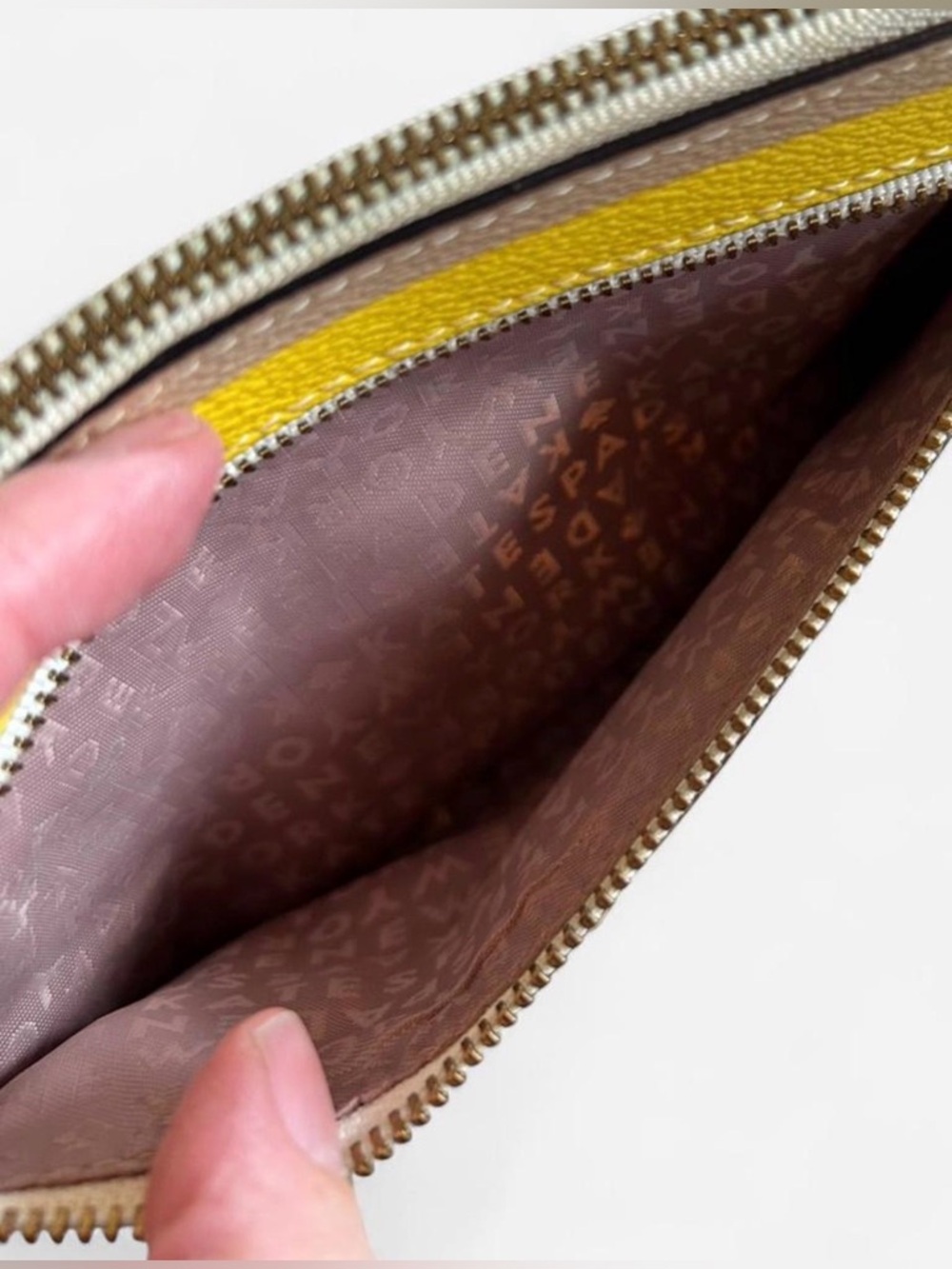 Kate Spade Grove Street Tinie
Wristlet in Dune Stripe - Picture 3 of 6